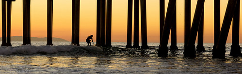ocean california ca travel sunset fall beach water lines vertical danger pier glow pacific dusk surfer wave surfing calif repetition pilings southerncalifornia huntingtonbeach 2013 hhsc2000