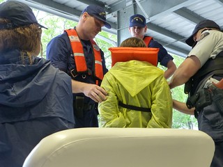 U.S. Coast Guard and RCMP students demonstrate a vessel boarding exercise April 15, 2014 for their "shiprider" training at the Maritime Law Enforcement Academy in Charleston, S.C. The Shiprider Program allows U.S. and RCMP law enforcement crew to board vessels together to achieve integrated operations on and near shared maritime borders. U.S. Coast Guard photo by Senior Chief Petty Officer Sarah B. Foster