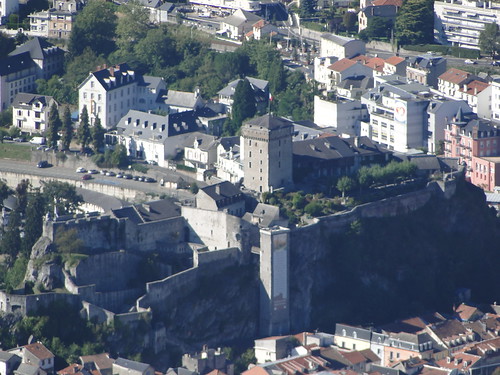 trees houses roof france castle rock french town europe view fort hill towers medieval keep walls fortification chateau protection fortress defense lourdes distant outpost midipyrenees donjon