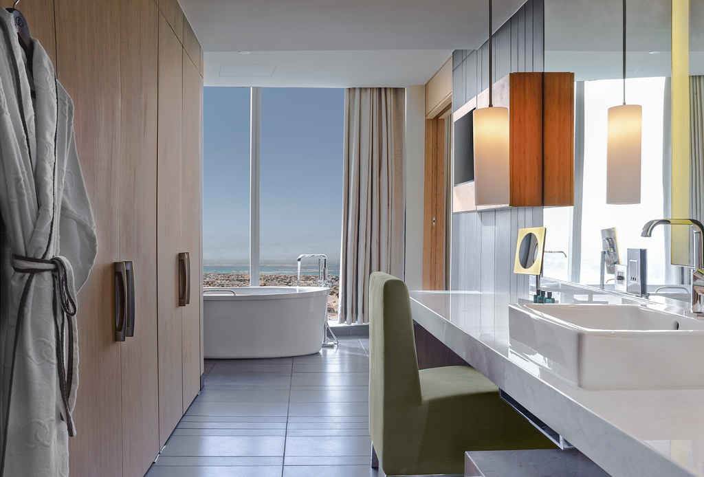 bathroom with view ocean beach overlooking beautiful relax modern floating vanity vessel sink bath tub stylish luxury simple minimalist