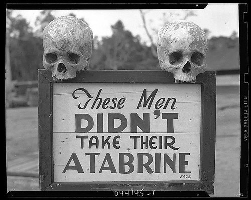 Advertisement for Atabrine, an anti-malaria drug Sign was put up at the 363rd station hospital in Papua, New Guinea during WWII
