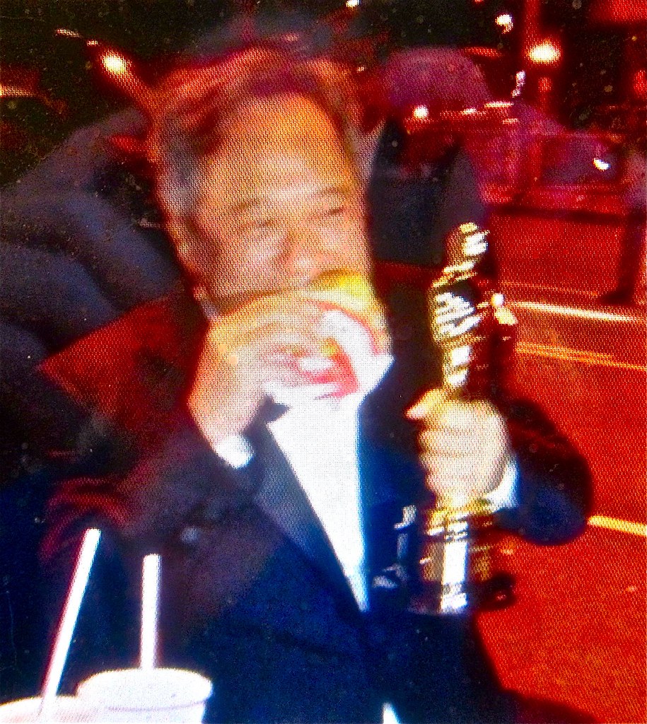 director Ang Lee eating double at Oscar party