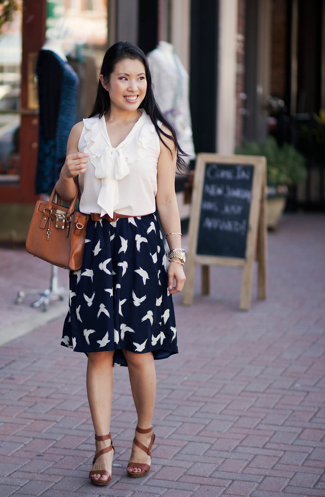 surfdome sugarhill boutique birds of prey printed navy skirt, ivory pussy bow sleeveless top, sole society monica sandals, melie bianco madison crossbdy purse outfit #ootd