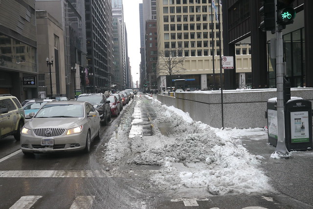 Snow in the Dearborn protected bike lane