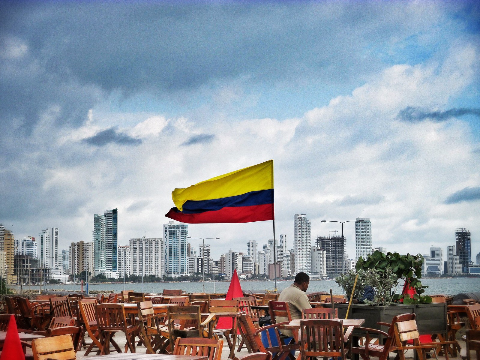 A Colombian flag above the Cartagena skyline