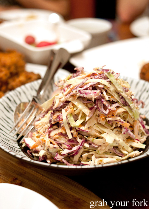 Cabbage slaw with carrots, onions and granny smith apples