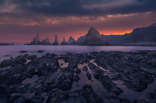 mar nubes sol amanecer rocas agua luces costa arena asturias españa gueirua reflejos largaexposición