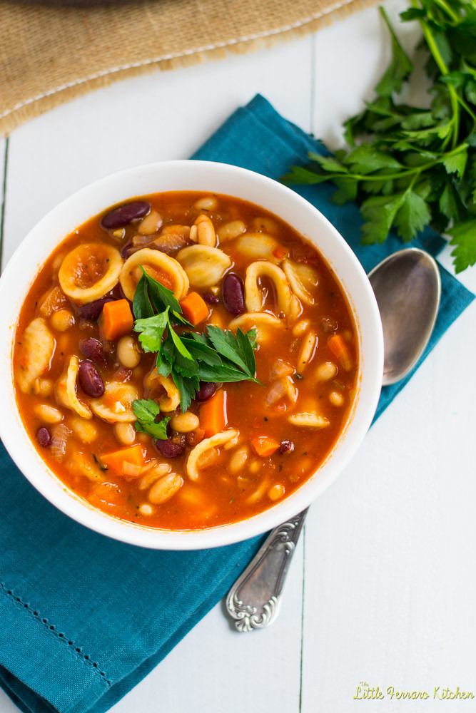 An easy and hearty one-pot soup, vegetarian pasta fagioli is full of two kinds of beans, pasta, sweet tomatoes and fresh herbes.