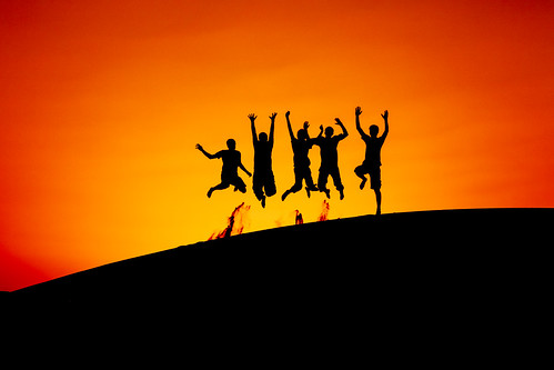 sunset red people orange sun color silhouette yellow person jump gnome sand desert dunes dune