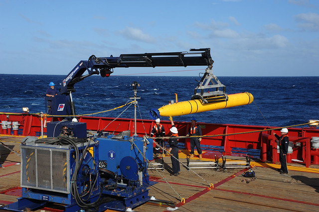 The U.S. Navy assists in the search for Malaysia Airlines flight MH370.