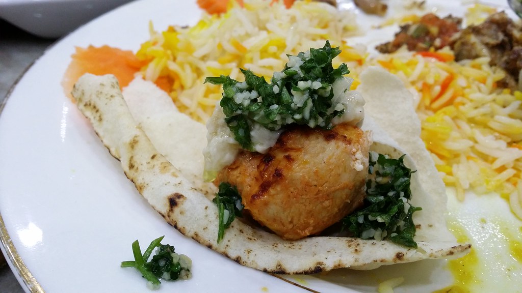 Kebab on Kohbz (Bread) with Homus (Sauce) and Tabula (Salad)