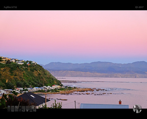 sunset sky water coast mountains coastal caostline tomraven aravenimage houses pink blue pinkblue q12017 fujifilm xt10