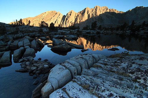 highsierra mountains mountain lake rock rocks landscape wilderness yosemite water sunrise alpineglow reflection