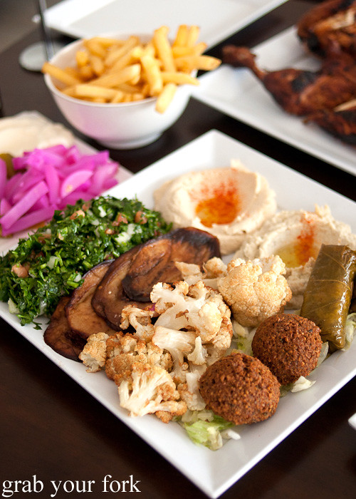 Vegetarian platter with falafel, tabouleh, dolmades, eggplant and cauliflower at Hawa Charcoal Chicken, Granville