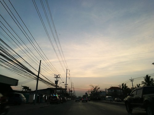 car street sunset road landvehicle sky outdoors nopeople transportation thailand city telephoneline