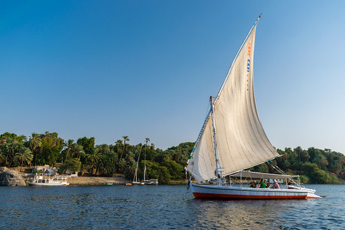 egypt aswan river nile sail boat blue sky landscape