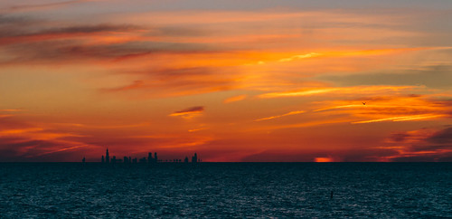 city sunset sun lake chicago water colors horizontal skyline clouds buildings colorful gbrearview unitedstates dusk searstower dunes may indiana lakemichigan hancock trump chesterton brilliant indianadunes lakefront 2014 chicagoist johncrouch willistower johncrouchphotography copyright2014johncrouch