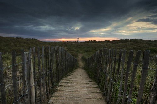 sunset sun lighthouse beach wales clouds landscape path sanddunes talacre