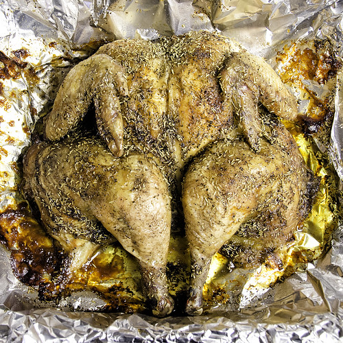 Spatchcock chicken with rosemary, pepper and garlic