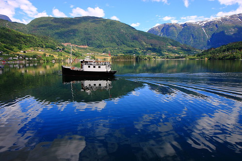 cruise sea sun reflection norway clouds reflections landscape boat ship view norwegian fjord ulvik