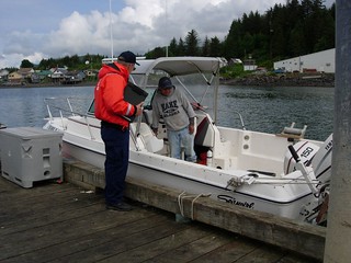 Coast Guard Auxiliary member Rick Rogers conducts a vesel safety exam at the pier in Kake, Alaska, June 11, 2011. The Coast Guard Auxiliuary is made up of approximately 34,000 volunteers who assist the Coast Guard with a vareity of missions. U.S. Coast Guard photo provided by Kate Rogers.            