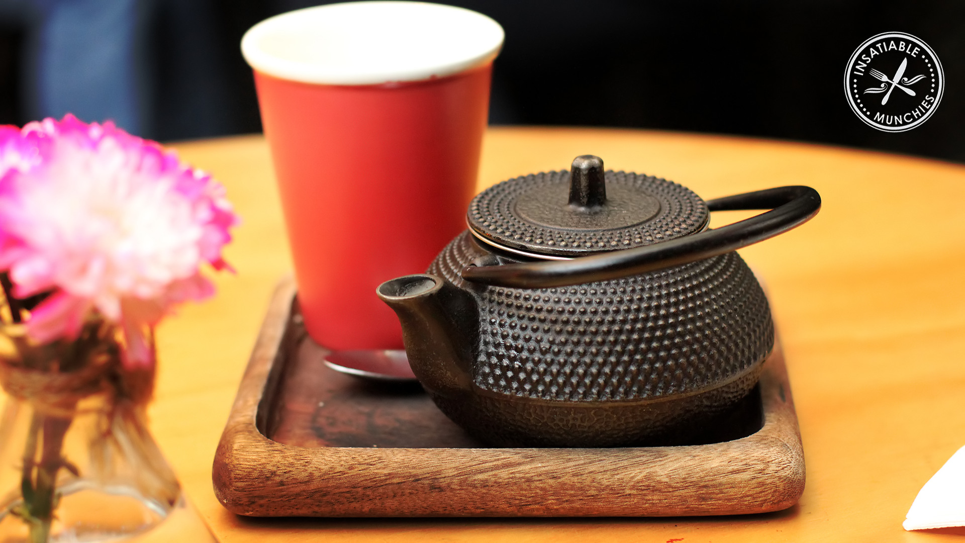 Chai tea served in a traditional iron tea pot