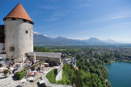 blue sky lake mountains castle zeiss town cafe bled 12mm touit
