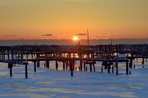 winter orange usa sun lake 3 snow cold color ice wisconsin clouds marina sunrise dawn frozen nikon midwest day freezing lakemichigan greatlakes shore milwaukee bayview lakefront southshore 2014 milwaukeelakefront southshoreyachtclub coolerbythelake milwaukeecountypark bayviewwi 55300mm d5100 uploaded:by=flickrmobile flickriosapp:filter=nofilter