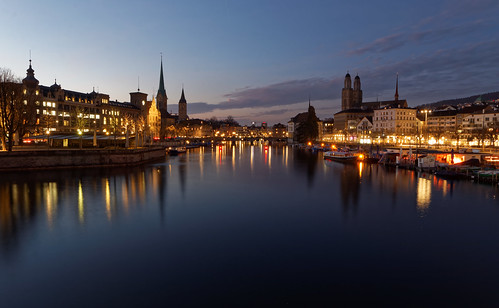 zurich switzerland limmat water river historic town city blue hour lights dusk sunset sky