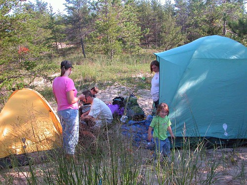 A family sets up camp on the 3,450-acre Nordhouse Dunes Wilderness Area in Michigan’s lower peninsula. (U.S. Forest Service)
