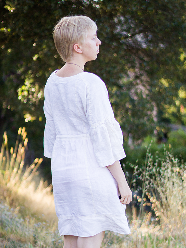 posing in the forest, white linen summer dress