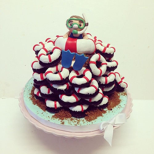 Mini baked chocolate donuts birthday tower #polkadotscupcakefactory