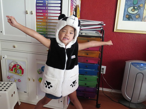 Amelie being silly in her Panda vest from China.