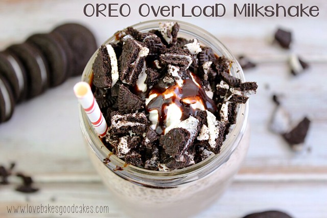 OREO Overload Milkshake - a delicious OREO milkshake topped with homemade whipped cream, chocolate syrup and more OREOS!! #milkshake #oreo #drink