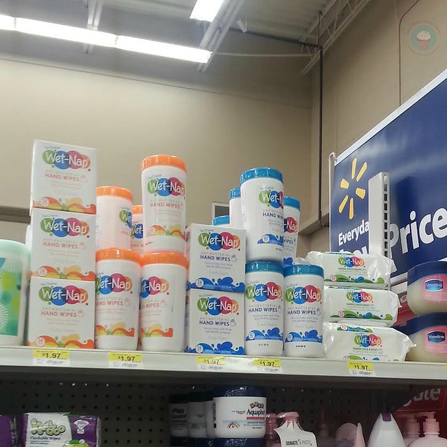 Grocery store isle with Wet Nap products on store shelf.