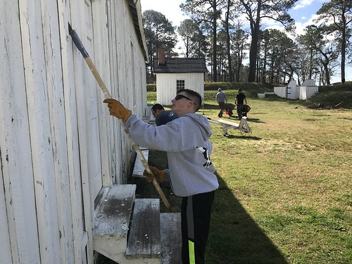 Photo of volunteers painting and landscaping at Point Lookout State Park