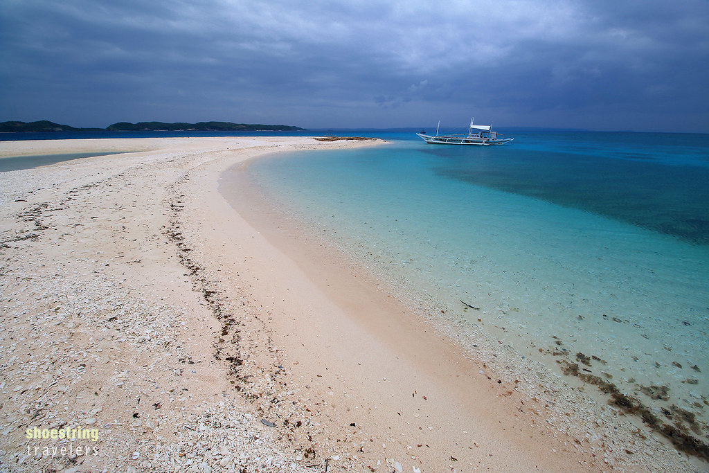white sand beach and aquamarine waters, Sombrero Island