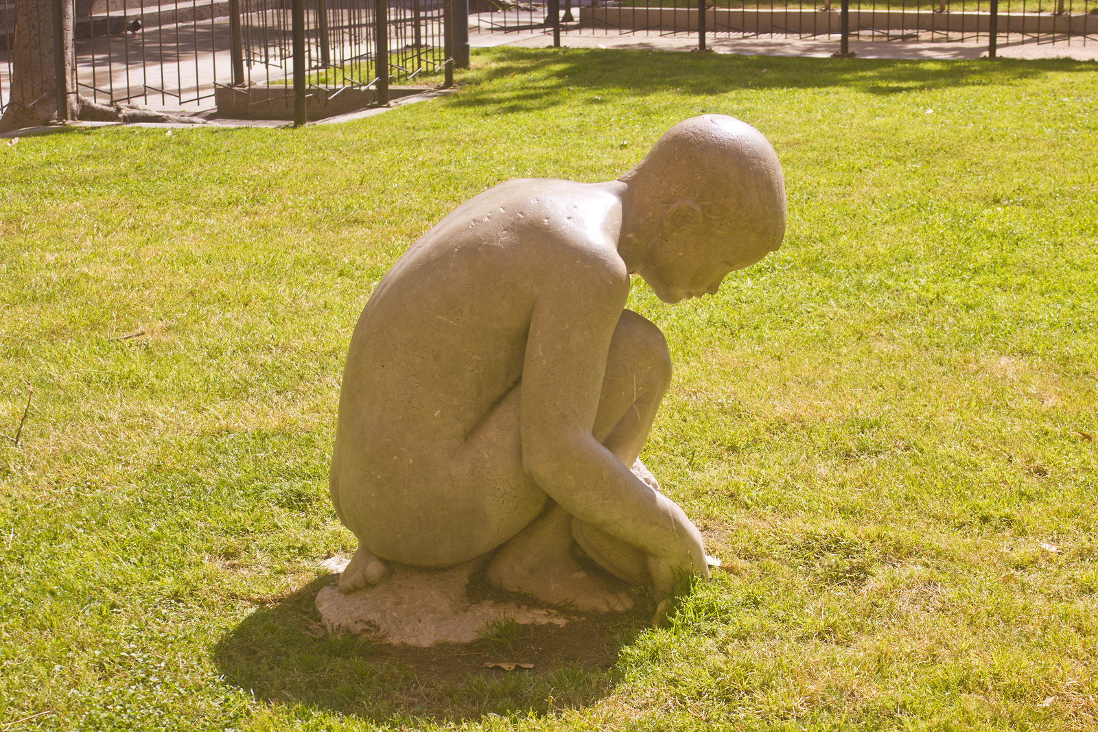 Barcelona baby statue of boy kneeling
