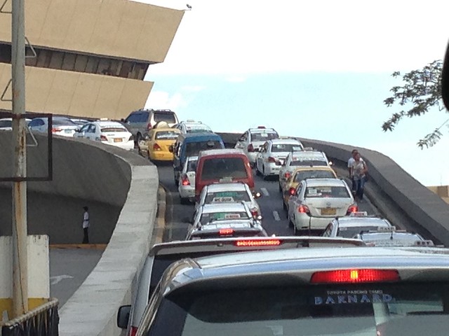 NAIA airport ramp, heavy traffic