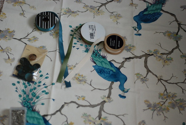 Peacock fabric and ribbons preparing to sew