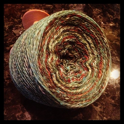 Plying cake! Contemplating fetching out one of the espinners because my foot is not happy.