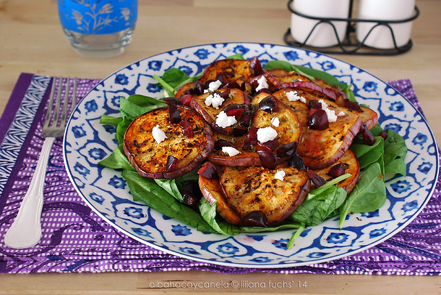 Grilled eggplant salad with spinach and cherries