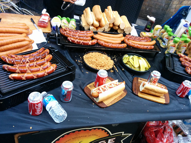 Giant hot dogs, Upmarket, Brick Lane, London, UK