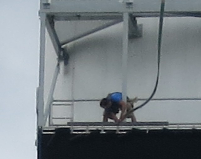 IMG_6520-2014-06-04-Corey-Tower-smokestack-building-digital-sign-wip detail dude working high