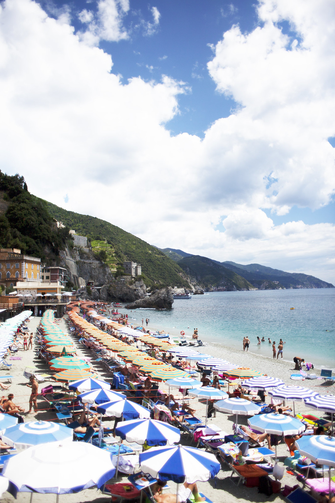Beach umbrellas in Monterosso, Cinque Terre, Italy