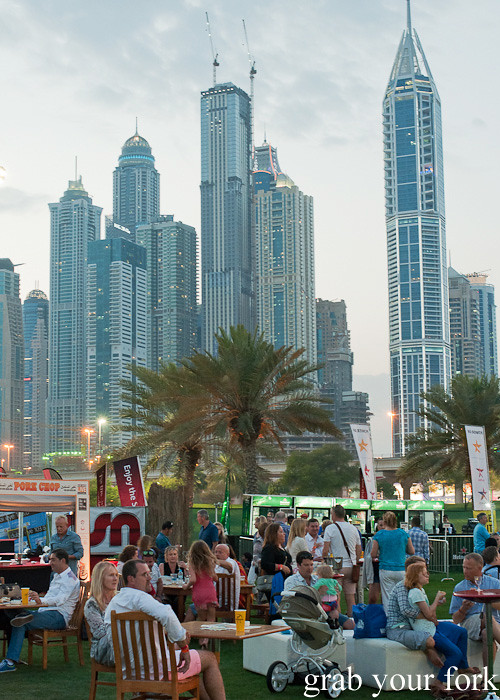 Crowds against a backdrop of skyscrapers at The Big Grill, part of the Dubai Food Festival