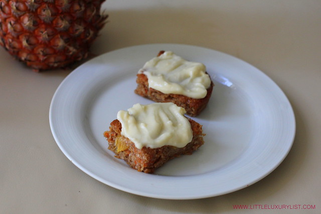Carrot pineapple cake side with frosting by little luxury list
