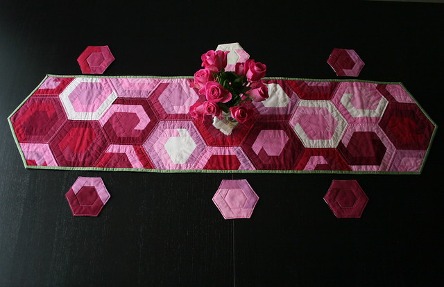 How to sew a log-cabin hexagon to make a table runner and matching set of coasters.