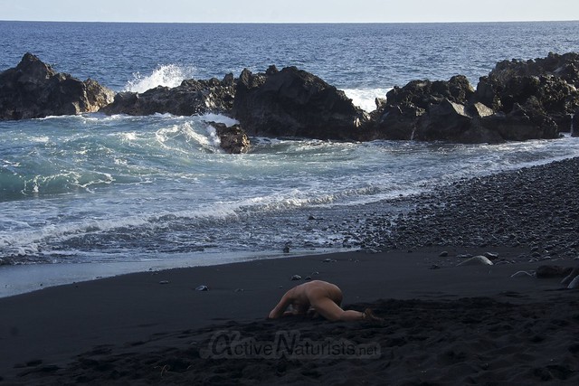 naturist yoga 0004 Kehena black sand beach, Hawaii, USA