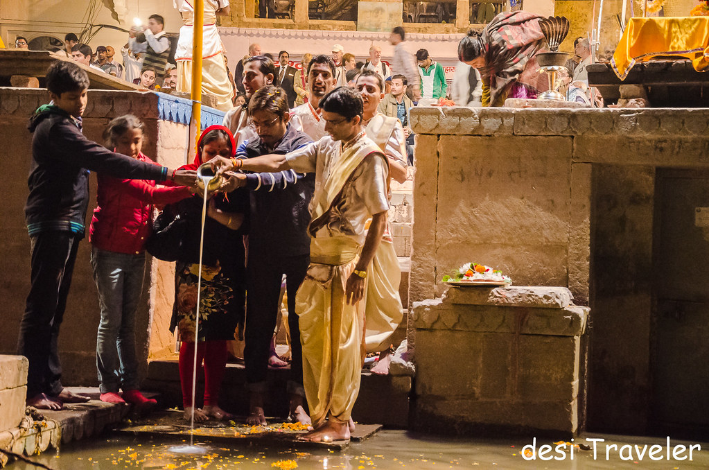 Ganga Aarti priests and pilgrims offering milk in ganga Evening Ganga Aarti Dashashwamedh Ghat Varanasi